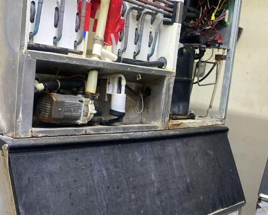 ICE-O-Matic commercial ice machine opened during compressor replacement and sealed system repair